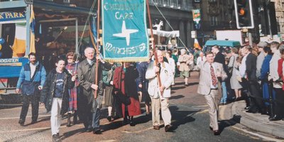 Photo of Irish Community Care in the Manchester St. Patrick’s Day parade from the Irish Community Care office in Levenshulme