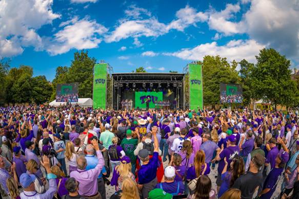 Crowd of fans watching a TCU event