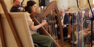 Harpist Tara Viscardi plays at the Irish embassy in London