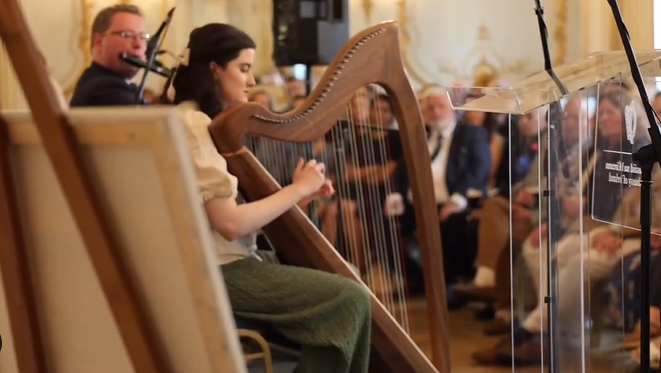 Harpist Tara Viscardi plays at the Irish embassy in London