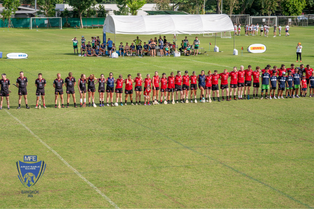 The Singapore Gaelic lions senior mens, womens, hurling and camogie teams on the pitch before their finals at the 2024 Asian Gaelic Games in Thailand