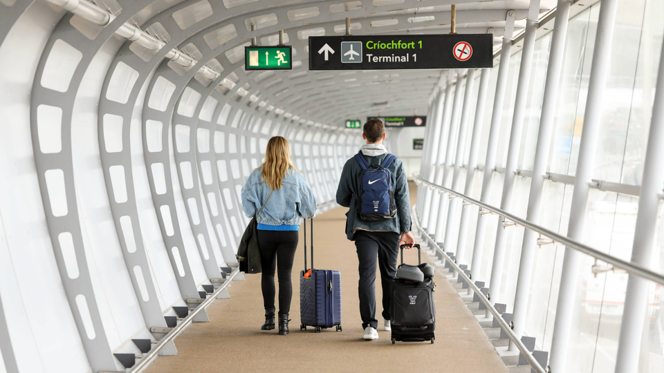 A couple walking in Dublin Airport