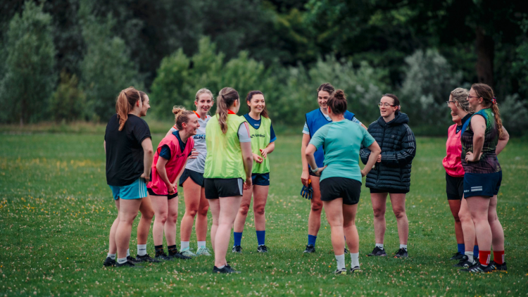 Team gathered in huddle in training session