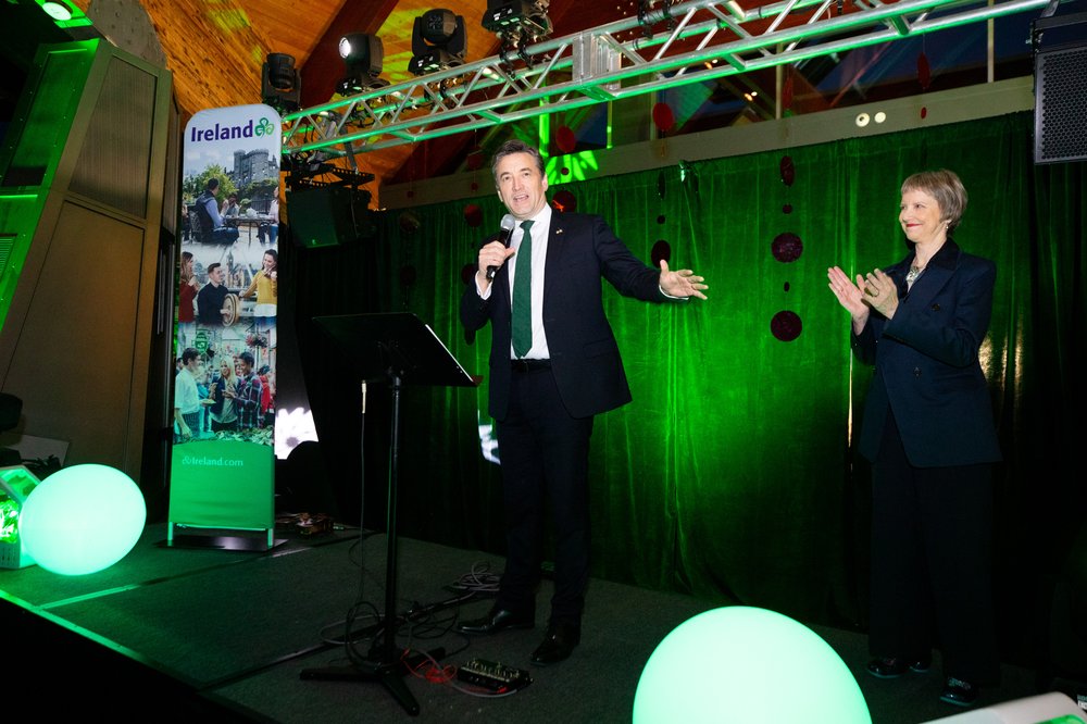 Ambassador John Concannon on stage