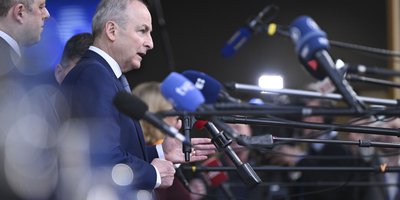 Taoiseach Micheál Martin speaks to the media in advance of the European Council summit in Brussels.

Minister Thomas Byrne is standing to the right of the Taoiseach.