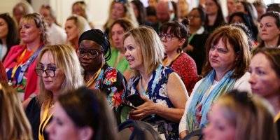 a crowd of attendees at an Awaken Angels investment event in London