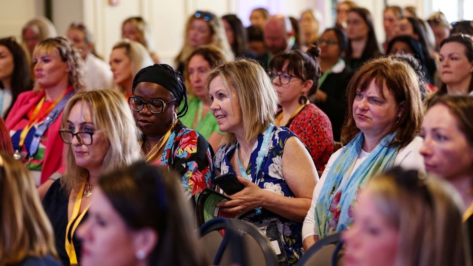 a crowd of attendees at an Awaken Angels investment event in London
