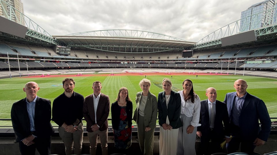 Group of people smiling together in Croke Park.