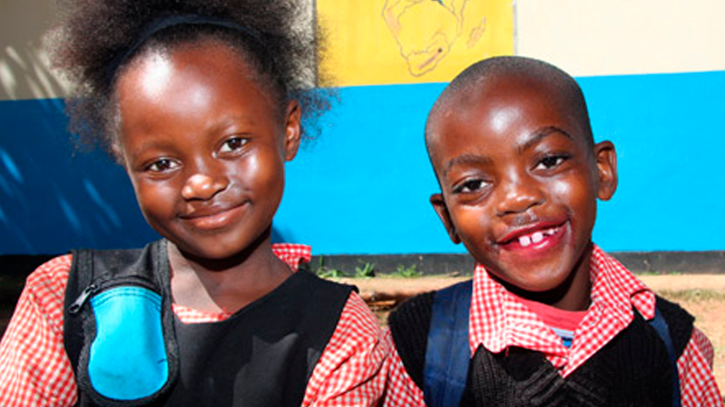 Two children smiling for the camera