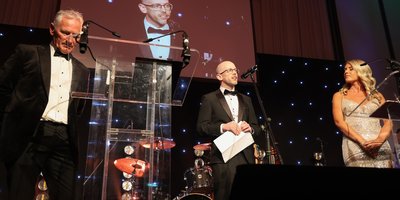 speaking at the lecturn