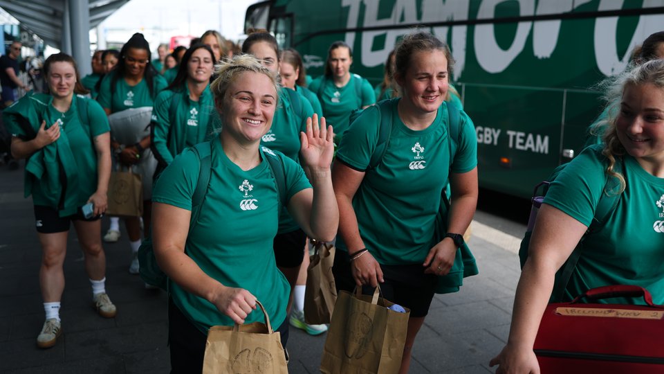 Irish Women's Rugby World Cup team waving after arriving at the airport on a bus