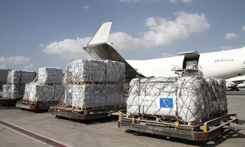 Aid palletts ready to load onto plane