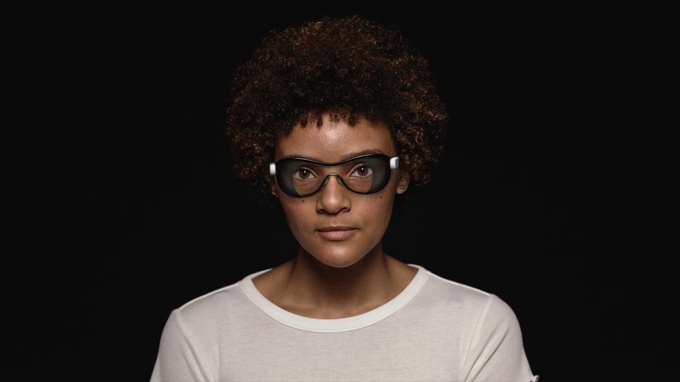 A person wearing Oasis glasses