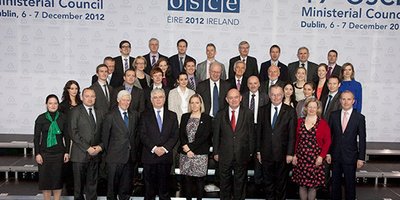 The 2012 Ireland Chairpersonship team with Tánaiste Eamon Gilmore at the 19th OSCE Ministerial Council in Dublin