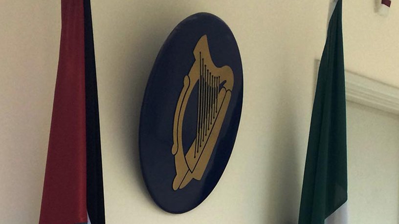 Sign with Irish harp hanging on the wall
