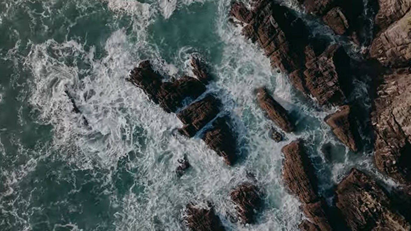 Atlantic coast from above with waves crashing on rocks