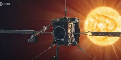 satellite in front of the sun