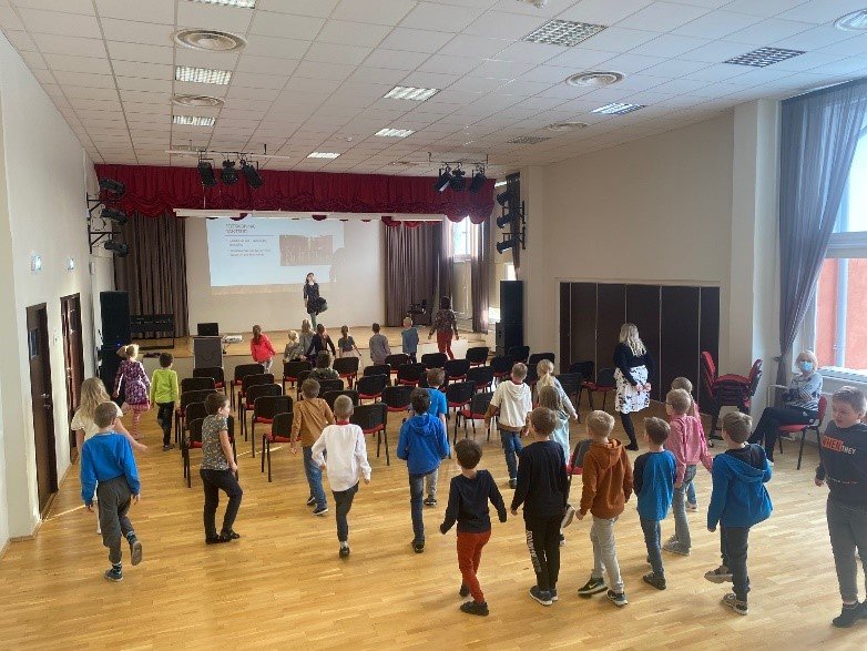 Group of children learning to dance