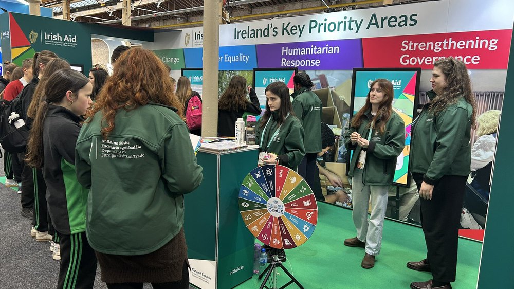 Lots of people viewing an exhibition stand for the young scientists